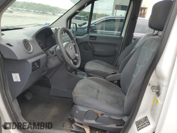 2010 Ford Transit Connect XLT with VIN NM0KS6BNXAT000034, listed as a Copart auction lot 54598985 with 133,444 mi miles and Salvage title. Bid and sale history available at DreamBid. Image 7.