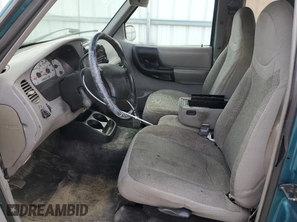 1997 Ford Ranger XLT with VIN 1FTCR14X0VPB40063, listed as a Copart auction lot 84930094 with 121,186 mi miles and Salvage Title. Bid and sale history available at DreamBid. Image 7.