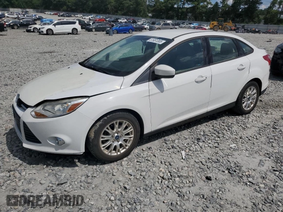 2012 Ford Focus SE with VIN 1FAHP3F2XCL406031, listed as a Copart auction lot 61961385 with 165,343 mi miles and Salvage title. Bid and sale history available at DreamBid. Image 1.