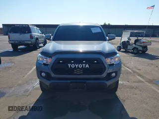 2021 Toyota Tacoma SR5 with VIN 5TFAZ5CN7MX101810, listed as a IAAI auction lot 42454418 with 58,930 mi miles and . Bid and sale history available at DreamBid. Image 13.