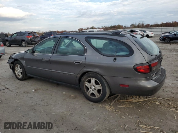 2002 Ford Taurus with VIN 1FAFP59S62A256119, listed as a Copart auction lot 79581164 with 57,128 mi miles and Clean title. Bid and sale history available at DreamBid. Image 2.