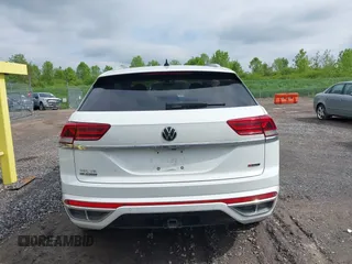 2021 Volkswagen Atlas SEL z VIN 1V2SE2CA7MC214805, wystawiony jako IAAI lot #42374591 z przebiegiem 61 775 mil mil oraz . Historia ofert i sprzedaży dostępna na DreamBid. Obrazek 17.