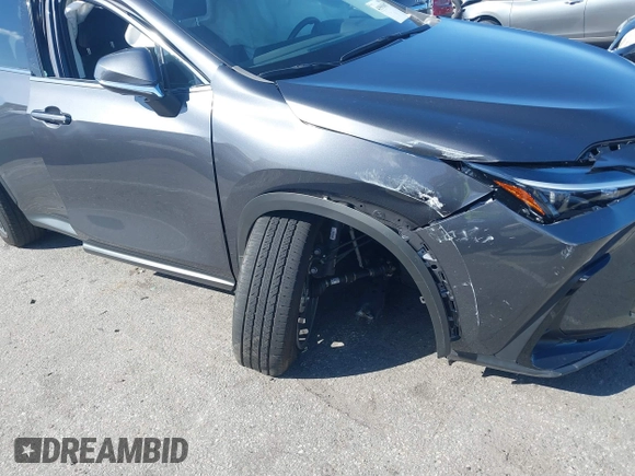 2023 Lexus NX 250 z VIN 2T2ADCAZXPC003877, wystawiony jako IAAI lot #41593097 z przebiegiem 14 597 mil mil oraz . Historia ofert i sprzedaży dostępna na DreamBid. Obrazek 17.
