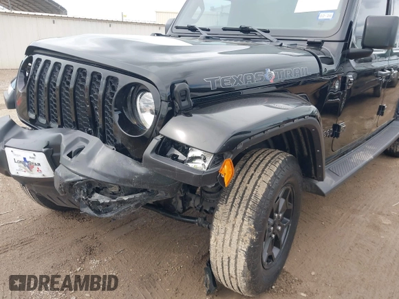 2021 Jeep Gladiator Freedom z VIN 1C6HJTAG4ML586999, wystawiony jako IAAI lot #41911751 z przebiegiem 81 030 mil mil oraz . Historia ofert i sprzedaży dostępna na DreamBid. Obrazek 6.