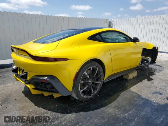 2019 Aston Martin Vantage z VIN SCFSMGAW6KGN01897, wystawiony jako Copart lot #51802505 z przebiegiem Nie podano mil oraz Szkoda całkowita • Salvage title. Historia ofert i sprzedaży dostępna na DreamBid. Obrazek 3.