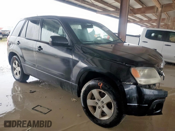 2011 Suzuki Grand Vitara Premium with VIN JS3TD0D28B4102365, listed as a Copart auction lot 60560495 with 176,190 mi miles and Salvage title. Bid and sale history available at DreamBid. Image 4.