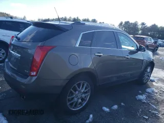 2014 Cadillac SRX Premium Collection z VIN 3GYFNGE37ES566089, wystawiony jako Copart lot #83595454 z przebiegiem 209 155 mil mil oraz Szkody całkowita. Historia ofert i sprzedaży dostępna na DreamBid. Obrazek 3.