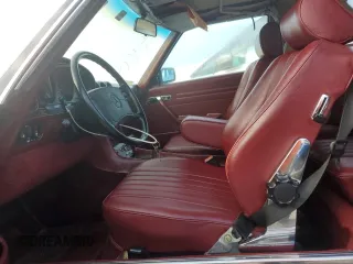 1987 Mercedes-Benz 560 with VIN WDBBA48D9HA060044, listed as a Copart auction lot 76965694 with 76,957 mi miles and Non Repairable. Bid and sale history available at carsss.com. Image 7.