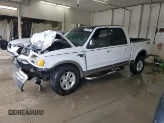 2003 Ford F-150 XLT with VIN 1FTRW08L23KA65560, listed as a Copart auction lot 61349145 with 207,887 mi miles and Salvage title. Bid and sale history available at DreamBid. Image 1.