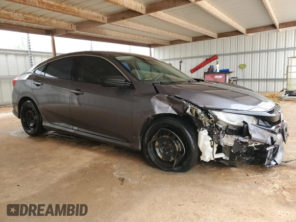 2020 Honda Civic LX with VIN 19XFC2F67LE212639, listed as a Copart auction lot 51865825 with 96,746 mi miles and Clean Title. Bid and sale history available at DreamBid. Image 4.
