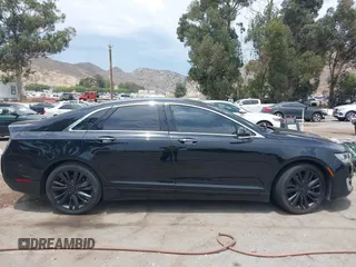2017 Lincoln MKZ Reserve z VIN 3LN6L5EC2HR622768, wystawiony jako IAAI lot #42394044 z przebiegiem 78 914 mil mil oraz . Historia ofert i sprzedaży dostępna na DreamBid. Obrazek 13.