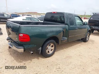 2001 Ford F-150 XL with VIN 1FTZX07271KB88709, listed as a IAAI auction lot 42599181 with 153,985 mi miles and . Bid and sale history available at DreamBid. Image 4.