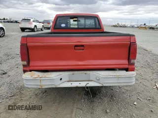 1988 GMC Sonoma with VIN 1GTBS14E2J2539806, listed as a Copart auction lot 71105184 with 141,085 mi miles and Salvage Title. Bid and sale history available at DreamBid. Image 6.