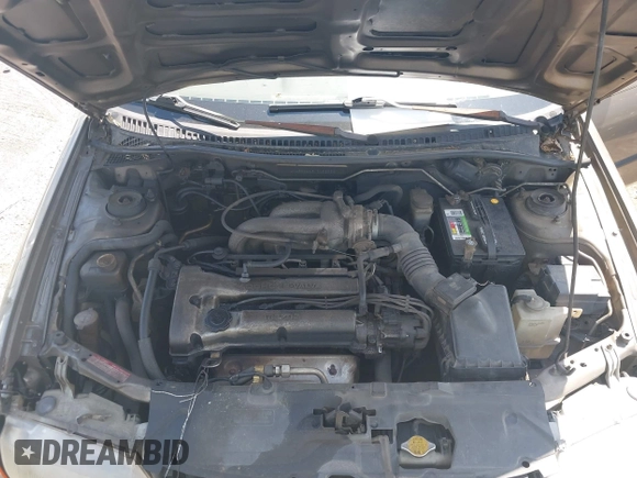 1997 Mazda Protege DX with VIN JM1BC1416V0132633, listed as a IAAI auction lot 42162630 with 234,300 mi miles and . Bid and sale history available at DreamBid. Image 10.