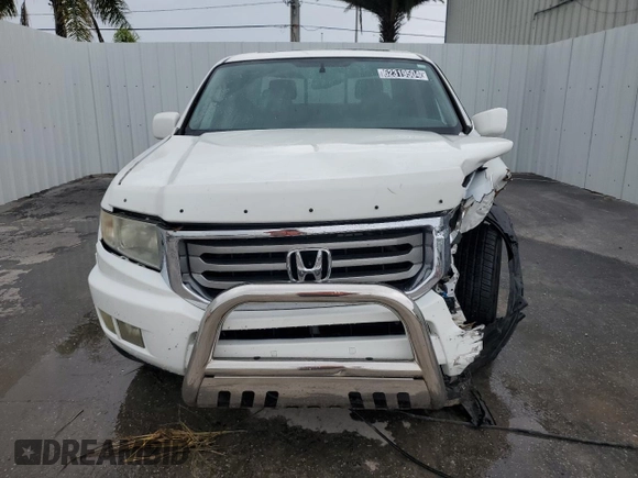 2014 Honda Ridgeline RTL with VIN 5FPYK1F57EB009851, listed as a Copart auction lot 62319504 with 55,718 mi miles and Clean Title. Bid and sale history available at carsss.com. Image 5.
