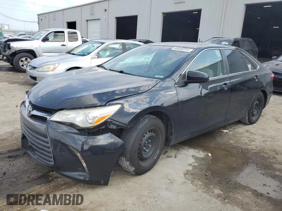 2015 Toyota Camry LE with VIN 4T1BD1FK7FU142189, listed as a Copart auction lot 66600314 with 194,969 mi miles and Salvage Title. Bid and sale history available at DreamBid. Image 1.