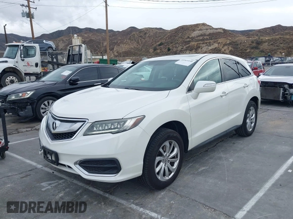 2018 Acura RDX with VIN 5J8TB3H31JL012439, listed as a IAAI auction lot 41565530 with 63,909 mi miles and . Bid and sale history available at DreamBid. Image 17.