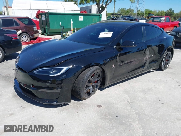 2023 Tesla Model S Plaid with VIN 5YJSA1E67PF528171, listed as a IAAI auction lot 41831086 with Not provided miles and . Bid and sale history available at DreamBid. Image 16.