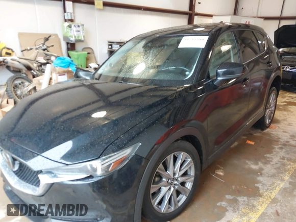 2020 Mazda CX-5 Grand Touring with VIN JM3KFADM3L0742625, listed as a IAAI auction lot 41715580 with 45,562 mi miles. Bid and sale history available at carsss.com. Image 18.