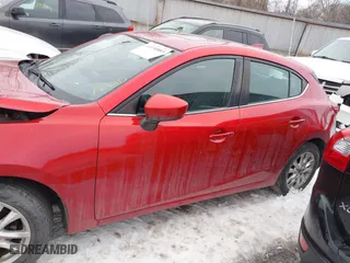 2016 Mazda Mazda3 i Grand Touring with VIN 3MZBM1N77GM245567, listed as a IAAI auction lot 41330883 with 128,423 mi miles. Bid and sale history available at carsss.com. Image 14.