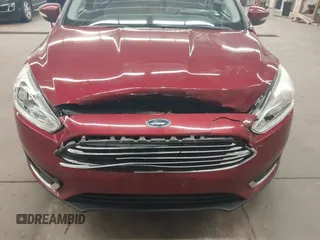 2015 Ford Focus Titanium с VIN 1FADP3N20FL220681, выставлен на аукционе IAAI как лот 42147480 с пробегом 118 778 миль миль и . История ставок и продаж доступна на DreamBid. Изображение 6.