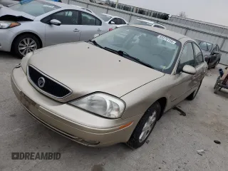 2001 Mercury Sable LS Premium with VIN 1MEFM55S61G639738, listed as a Copart auction lot 85276154 with 137,887 mi miles and Salvage Title. Bid and sale history available at DreamBid. Image 1.