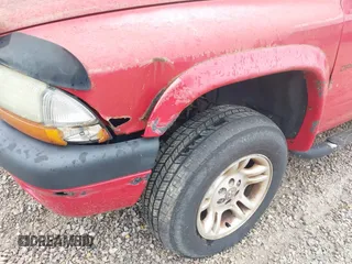 2002 Dodge Dakota Sport with VIN 1B7HG38N62S670613, listed as a IAAI auction lot 42133366 with 156,977 mi miles and . Bid and sale history available at carsss.com. Image 6.