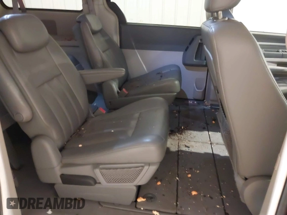 2009 Dodge Grand Caravan SXT z VIN 2D8HN54X39R551424, wystawiony jako IAAI lot #41370081 z przebiegiem 176 614 mil mil oraz . Historia ofert i sprzedaży dostępna na DreamBid. Obrazek 8.