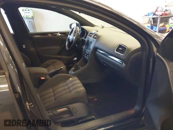 2012 Volkswagen GTI w/Sunroof & Navi PZEV with VIN WVWGD7AJ2CW100248, listed as a IAAI auction lot 41905190 with 106,489 mi miles and . Bid and sale history available at DreamBid. Image 5.
