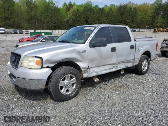 2005 Ford F-150 XLT with VIN 1FTRW12WX5FA79128, listed as a Copart auction lot 51963585 with 169,045 mi miles and Salvage Title. Bid and sale history available at carsss.com. Image 1.