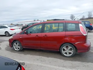 2009 Mazda Mazda5 Sport with VIN JM1CR293X90339440, listed as a IAAI auction lot 41525453 with 173,640 mi miles. Bid and sale history available at carsss.com. Image 14.