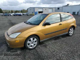 2001 Ford Focus ZX3 with VIN 3FAHP31381R139843, listed as a Copart auction lot 51316585 with 177,424 mi miles and Salvage title. Bid and sale history available at DreamBid. Image 1.