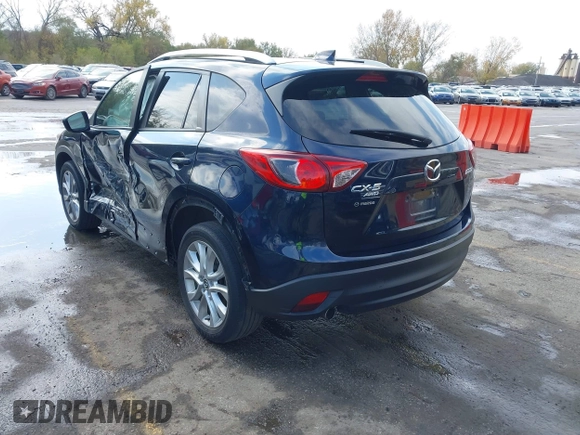 2015 Mazda CX-5 Grand Touring with VIN JM3KE4DY7F0478823, listed as a IAAI auction lot 40731626 with 82,884 mi miles. Bid and sale history available at carsss.com. Image 3.