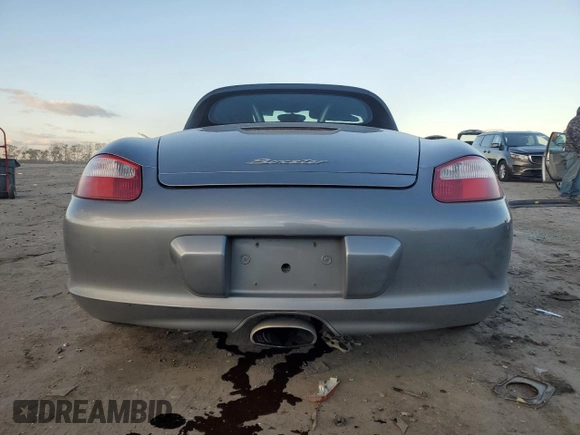 2005 Porsche Boxster с VIN WP0CA298X5U712093, выставлен на аукционе Copart как лот 82109144 с пробегом 138 144 миль миль и Списание • Salvage title. История ставок и продаж доступна на DreamBid. Изображение 6.