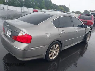 2010 Infiniti M with VIN JN1CY0APXAM910348, listed as a IAAI auction lot 42404010 with 216,965 mi miles and . Bid and sale history available at DreamBid. Image 4.