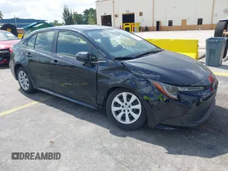 2023 Toyota Corolla LE with VIN JTDB4MEE2PJ004869, listed as a IAAI auction lot 42139964 with 41,119 mi miles. Bid and sale history available at carsss.com. Image 1.