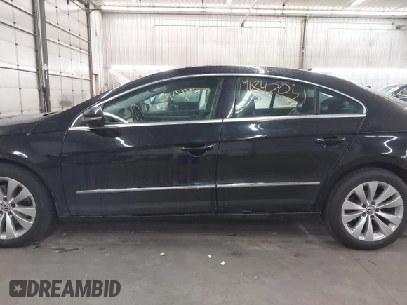 2012 Volkswagen CC Sport PZEV with VIN WVWMP7AN8CE537805, listed as a IAAI auction lot 41847051 with 147,095 mi miles. Bid and sale history available at carsss.com. Image 14.