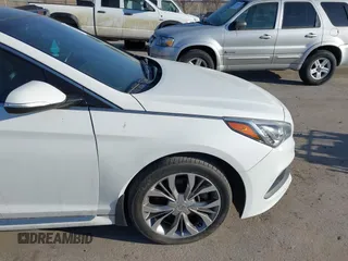 2015 Hyundai Sonata Sport with VIN 5NPE34AB6FH140232, listed as a IAAI auction lot 41805920 with 134,373 mi miles and . Bid and sale history available at carsss.com. Image 6.