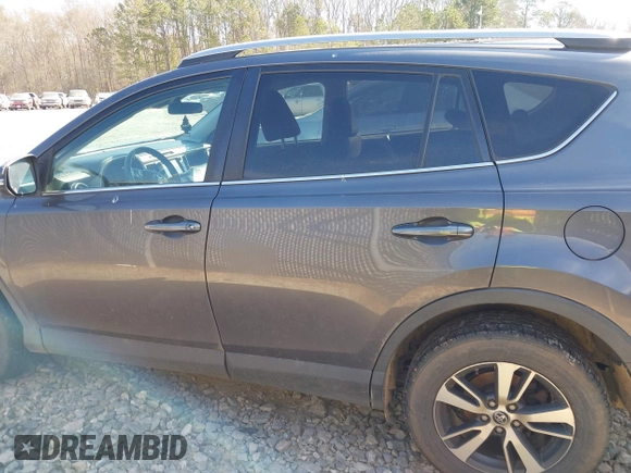 2018 Toyota RAV4 XLE with VIN 2T3WFREV2JW450019, listed as a IAAI auction lot 41704084 with 257,737 mi miles. Bid and sale history available at carsss.com. Image 14.
