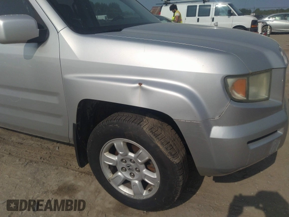 2007 Honda Ridgeline RTL z VIN 2HJYK16537H501200, wystawiony jako IAAI lot #42425662 z przebiegiem 188 618 mil mil oraz . Historia ofert i sprzedaży dostępna na DreamBid. Obrazek 18.