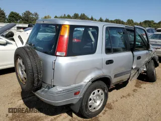 2000 Honda CR-V LX with VIN JHLRD1845YC029922, listed as a Copart auction lot 70307804 with 148,999 mi miles and Salvage Title. Bid and sale history available at carsss.com. Image 3.