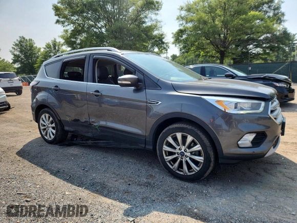 2018 Ford Escape Titanium with VIN 1FMCU9J90JUA15154, listed as a Copart auction lot 59768415 with 93,810 mi miles and Salvage title. Bid and sale history available at DreamBid. Image 4.