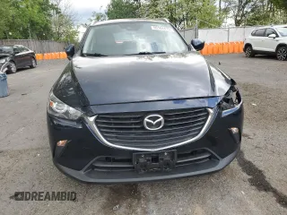 2018 Mazda CX-3 Sport z VIN JM1DKFB79J1323497, wystawiony jako Copart lot #56168875 z przebiegiem 60 284 mil mil oraz Szkoda całkowita • Salvage title. Historia ofert i sprzedaży dostępna na DreamBid. Obrazek 5.