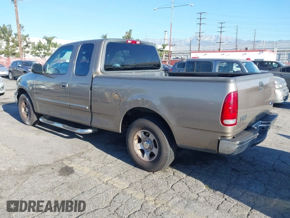 2002 Ford F-150 XL with VIN 1FTRX17232NA79508, listed as a IAAI auction lot 41870844 with 111,429 mi miles. Bid and sale history available at carsss.com. Image 3.