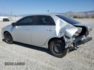 2013 Toyota Corolla L with VIN 5YFBU4EEXDP167695, listed as a Copart auction lot 52051685 with 192,427 mi miles and Salvage Title. Bid and sale history available at carsss.com. Image 2.