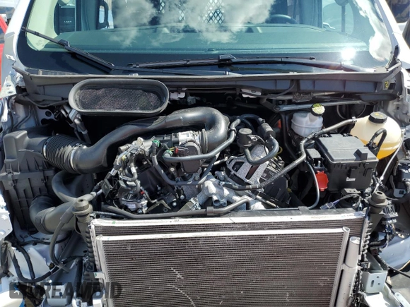 2023 Ford Transit Cargo with VIN 1FTBR1Y84PKA51644, listed as a Copart auction lot 54068155 with 12,978 mi miles and Clean Title. Bid and sale history available at DreamBid. Image 11.