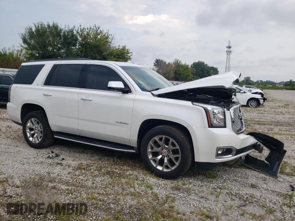 2016 GMC Yukon SLT with VIN 1GKS2BKC0GR265761, listed as a Copart auction lot 65645484 with 130,352 mi miles and Salvage Title. Bid and sale history available at carsss.com. Image 4.