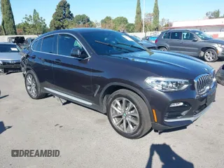 2019 BMW X4 xDrive30i with VIN 5UXUJ3C57KLG54956, listed as a IAAI auction lot 40778187 with 34,016 mi miles. Bid and sale history available at carsss.com. Image 1.