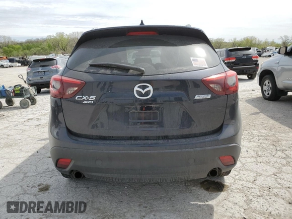 2016 Mazda CX-5 Grand Touring with VIN JM3KE4DYXG0844002, listed as a Copart auction lot 52712035 with 81,042 mi miles and Salvage Title. Bid and sale history available at DreamBid. Image 6.