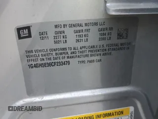 2012 Buick LaCrosse Premium 3 z VIN 1G4GH5E36CF233479, wystawiony jako Copart lot #63446125 z przebiegiem 28 151 mil mil oraz Szkoda całkowita • Salvage title. Historia ofert i sprzedaży dostępna na DreamBid. Obrazek 13.